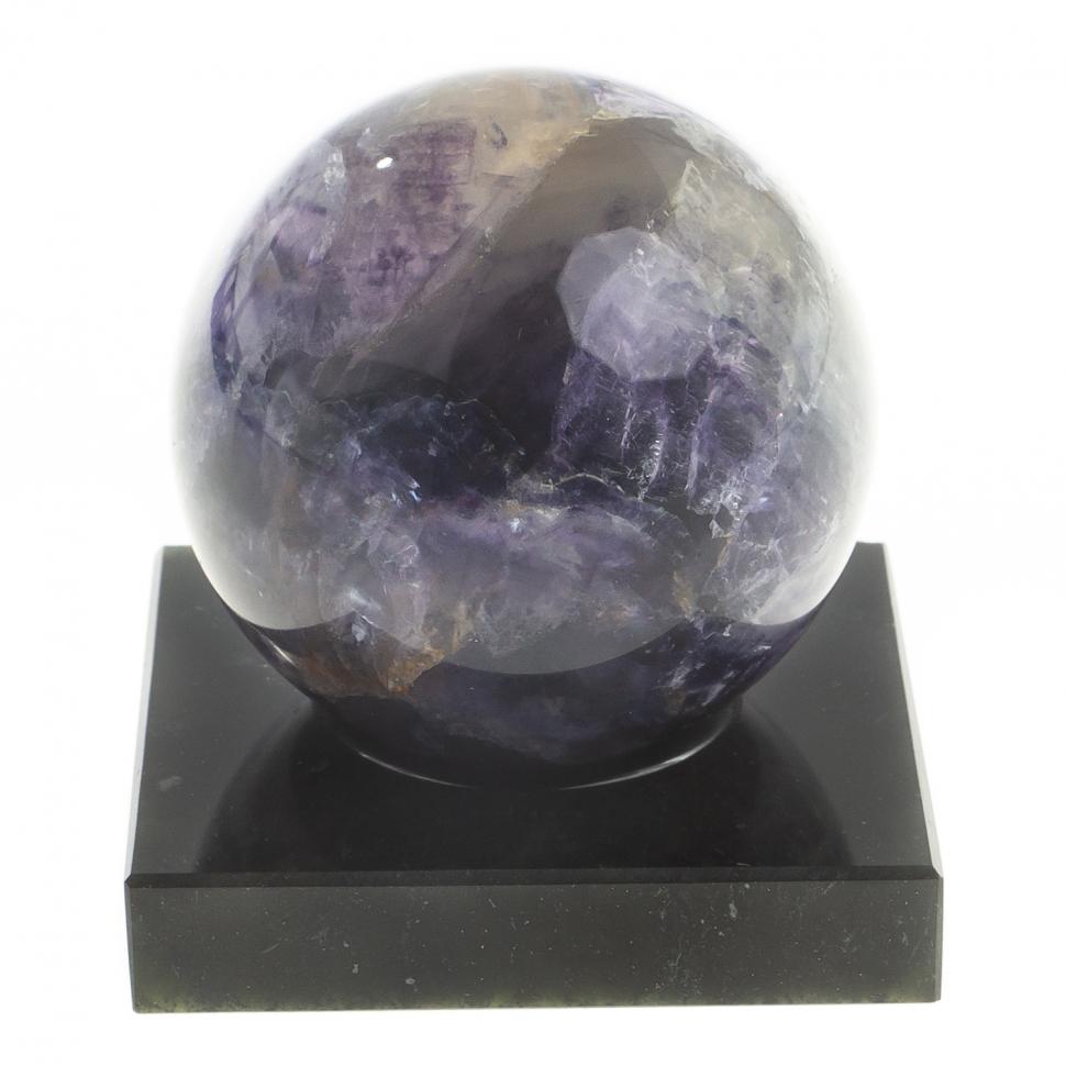 Шар из фиолетового флюорита 5 см на подставке фото 1 — 