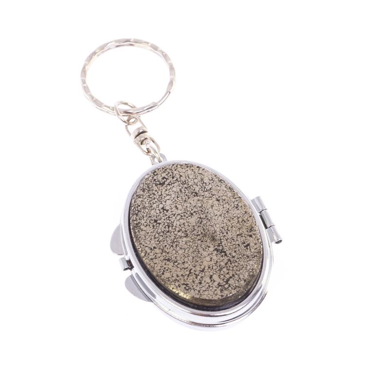 Складное зеркало брелок из камня пирит овальное фото 1 — 
